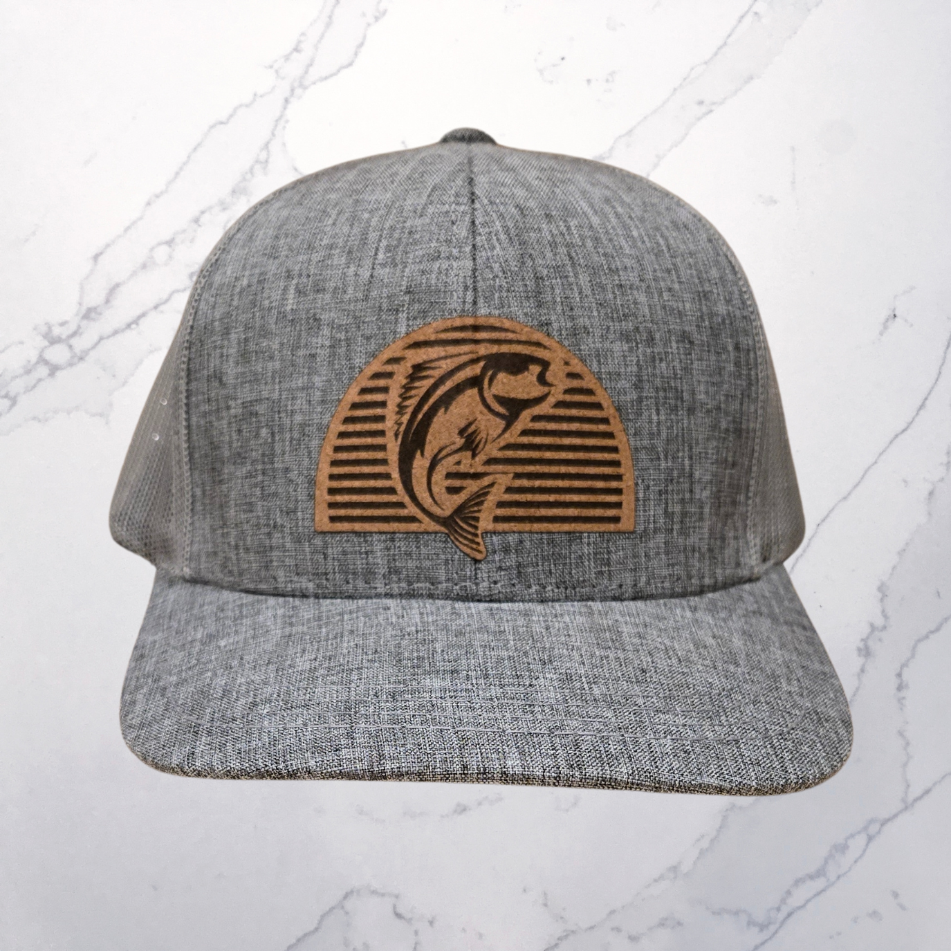 Heather Grey 6 Panel Trucker Hat with Cork Patch With a Fish