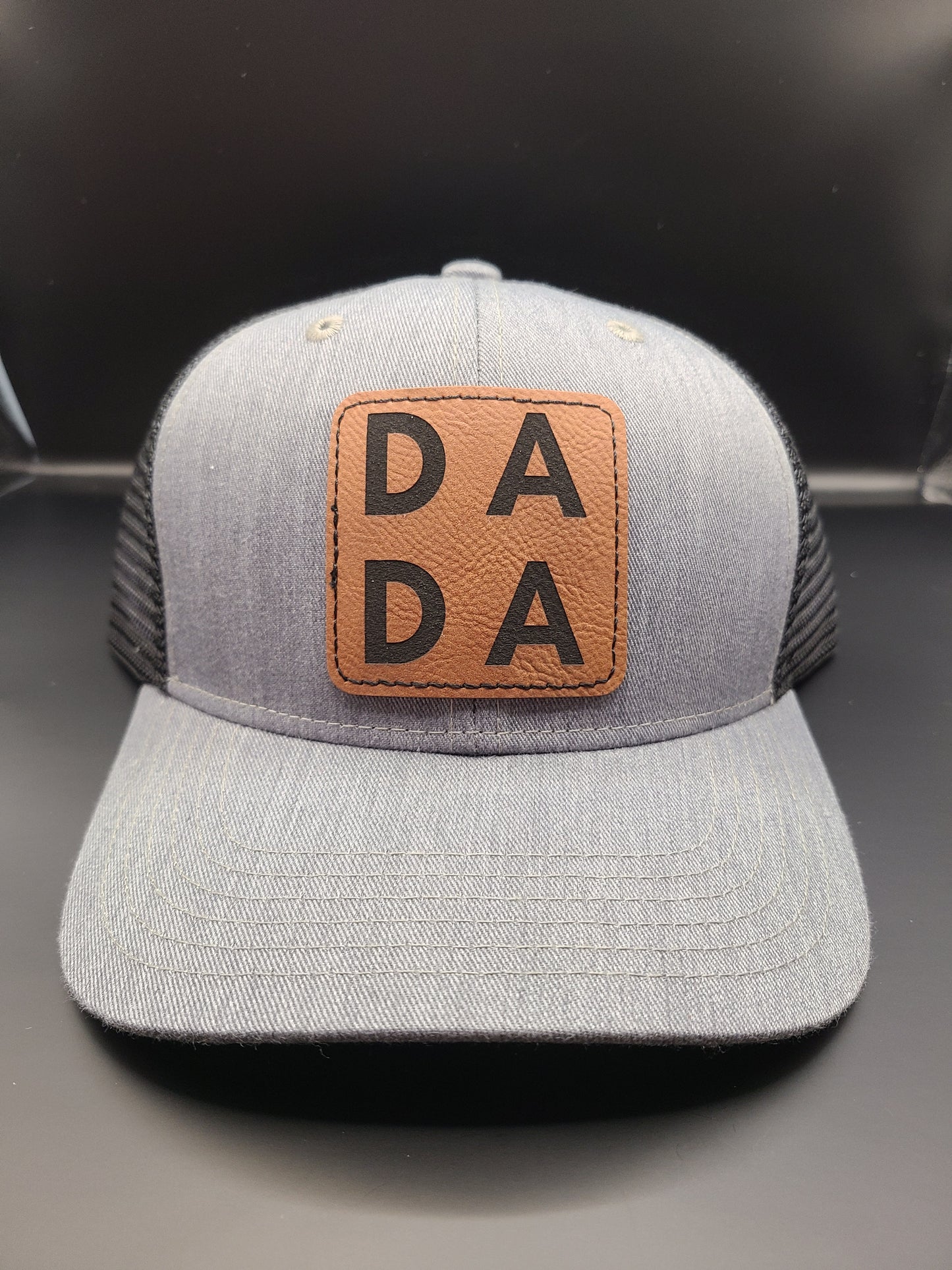 TRUCKER HAT WITH DADA PATCH (HEATHER GREY/BLACK MESH)