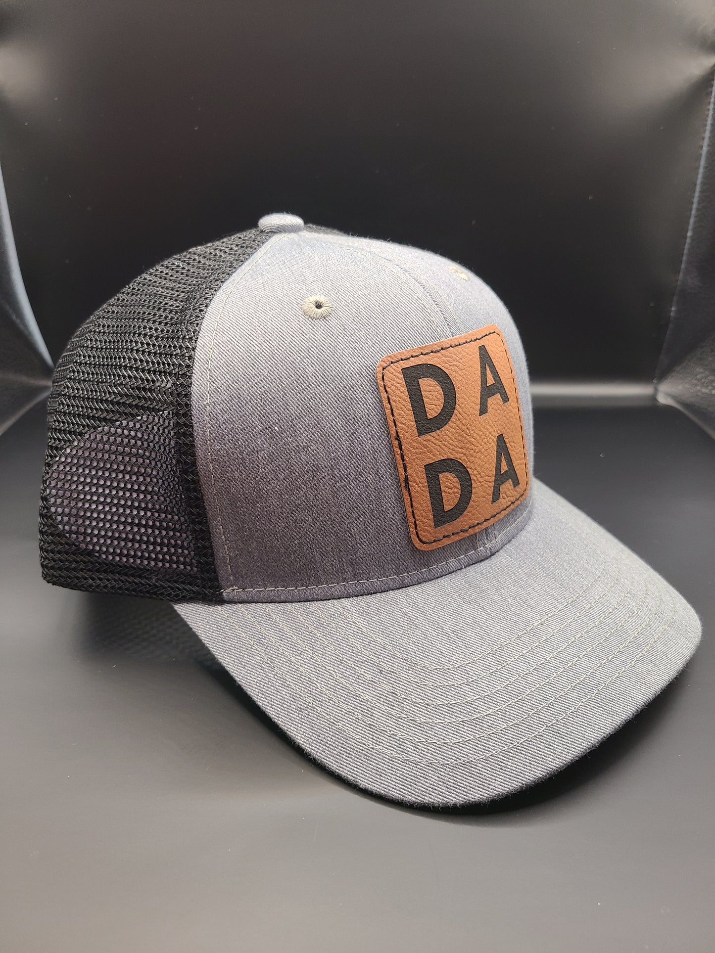 TRUCKER HAT WITH DADA PATCH (HEATHER GREY/BLACK MESH)