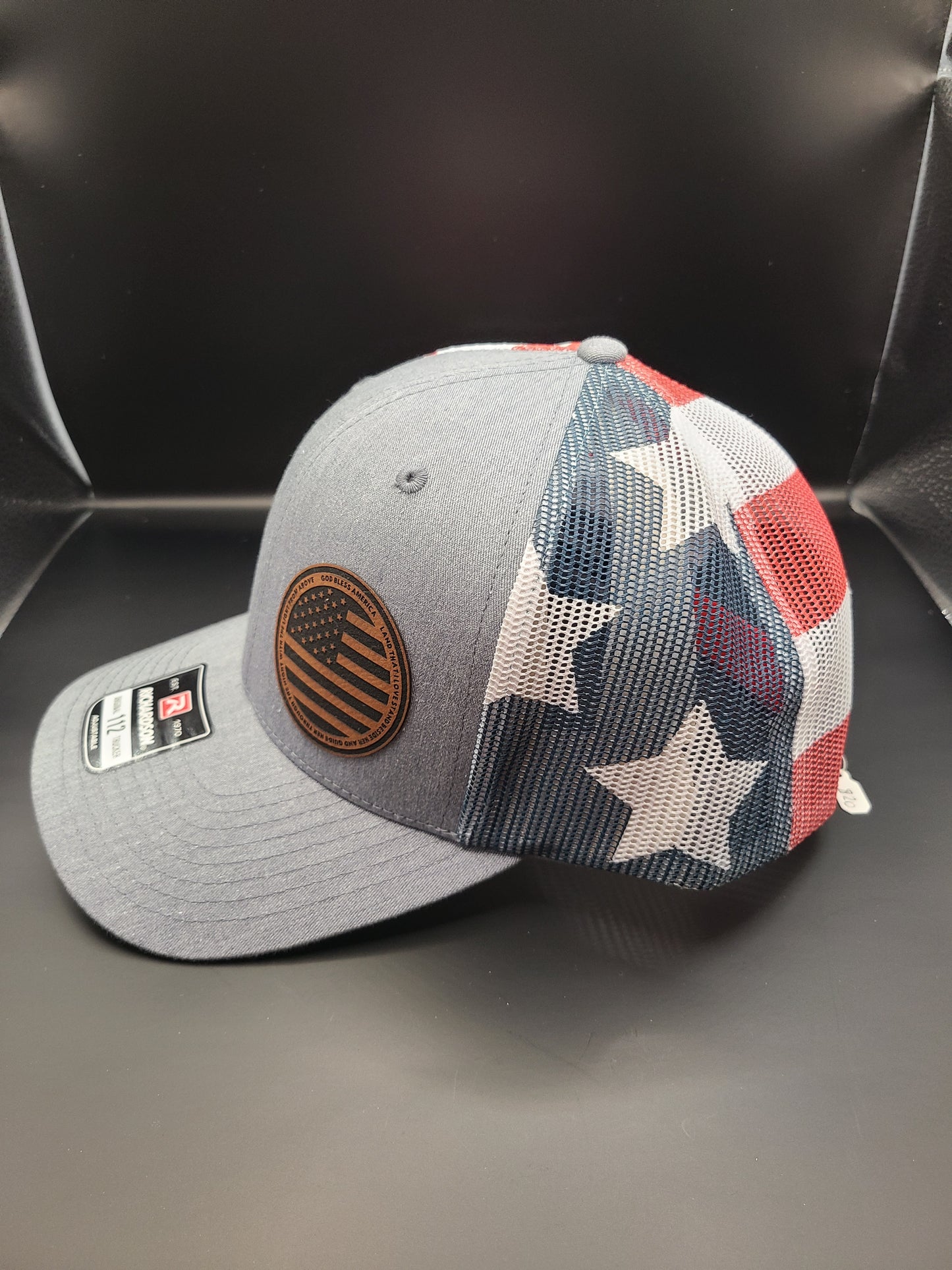 TRUCKER HAT WITH CIRCLE USA FLAG PATCH WITH GOD BLESS AMERICA AROUND THE EDGE