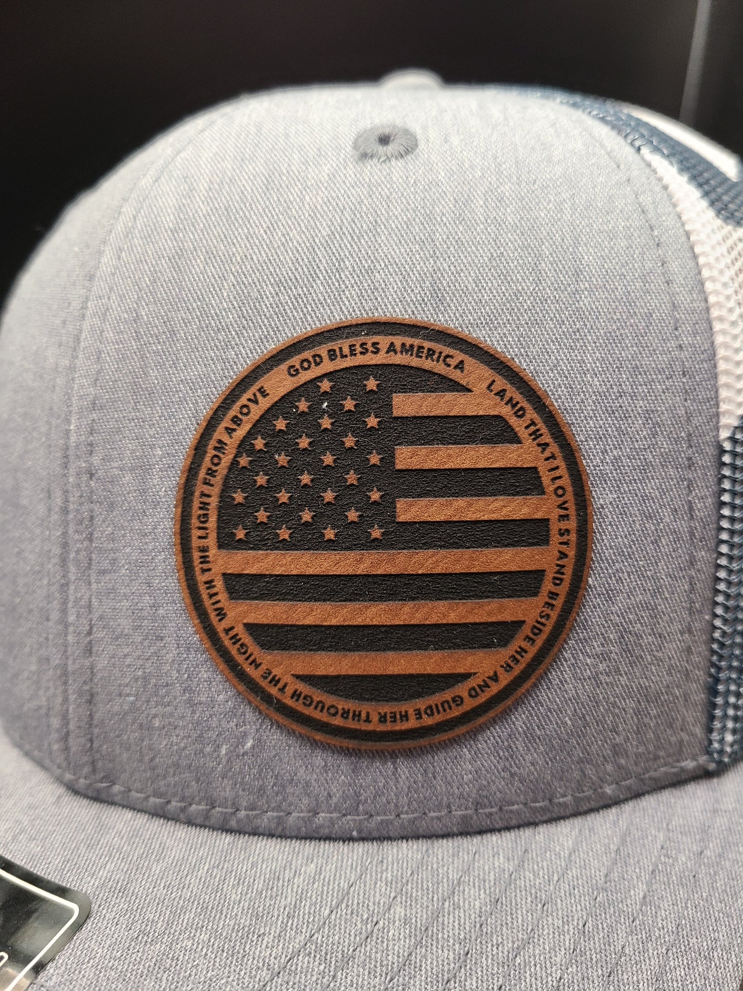 TRUCKER HAT WITH CIRCLE USA FLAG PATCH WITH GOD BLESS AMERICA AROUND THE EDGE