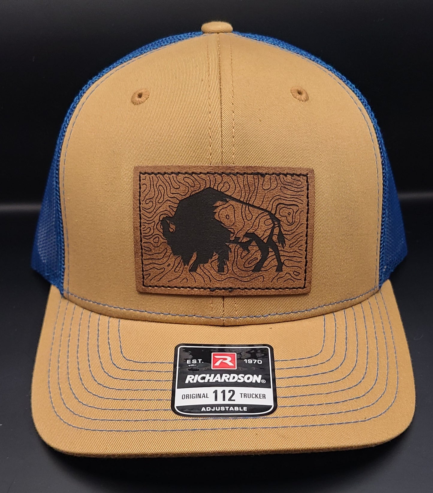 TRUCKER HAT WITH RECTANGLE BISON PATCH (BISCUIT/TRUE BLUE)